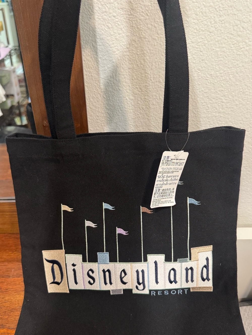 Disney Black Canvas Tote with Pastel Flag Accents